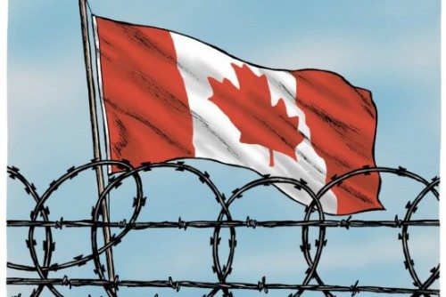 moudakis_canadian_flag_behind_barbed_wire.jpg.size.xxlarge.promo