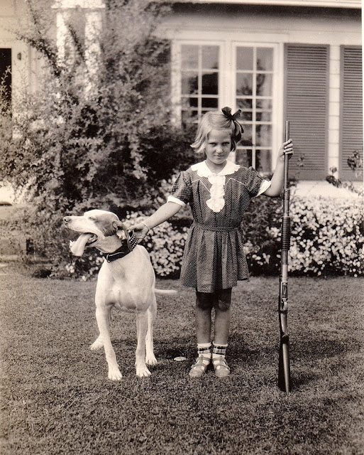 A girl and her dog, 1932